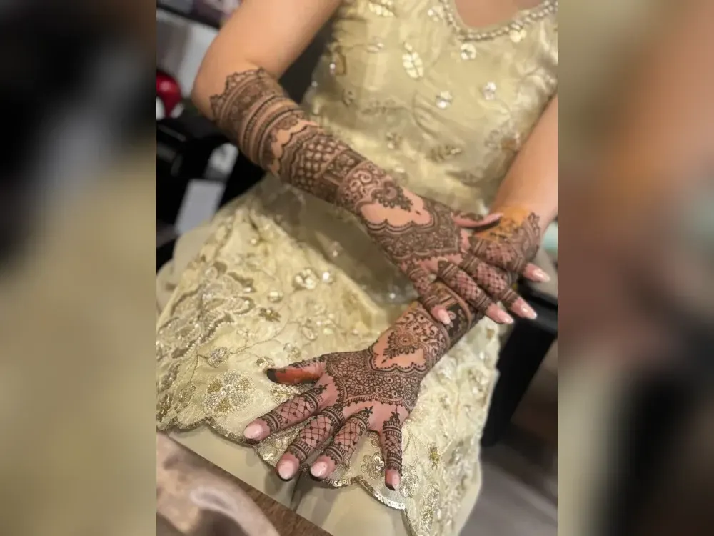 Hands showing the deep, even stain that careful aftercare protects