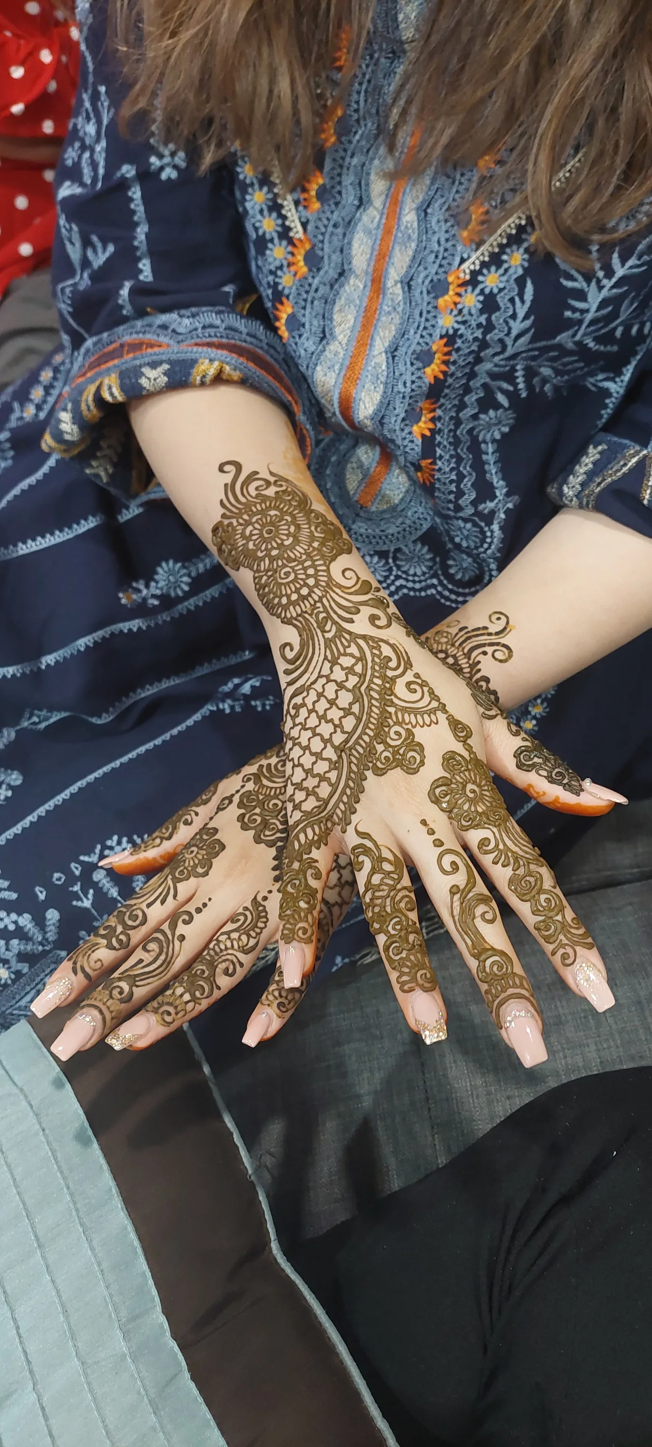 Dark henna on the back of a hand showing rich colour development