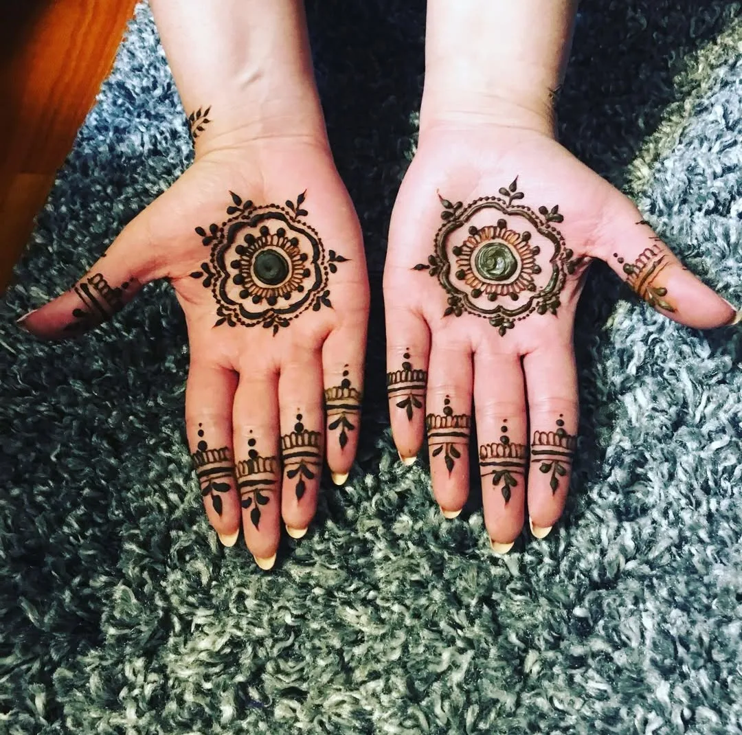 Indian bridal mehndi built around a focal mandala motif