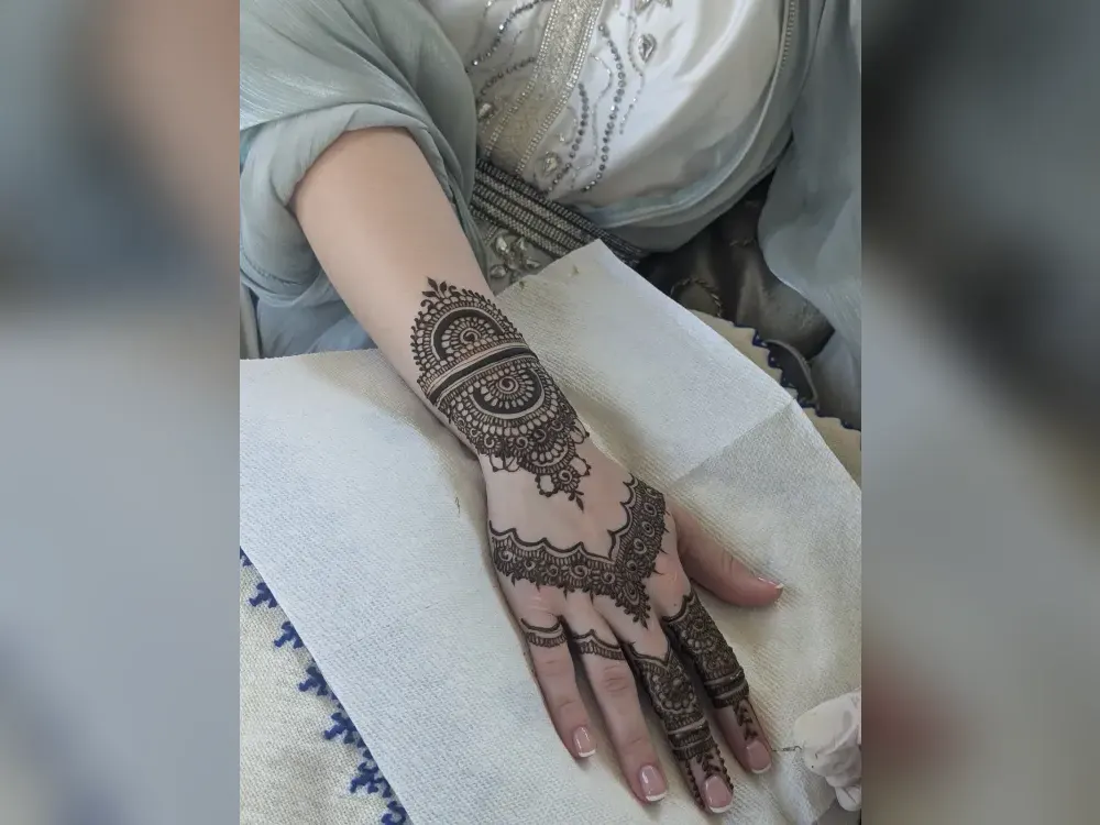 A single hand and forearm worked in the style a bride would test at a trial
