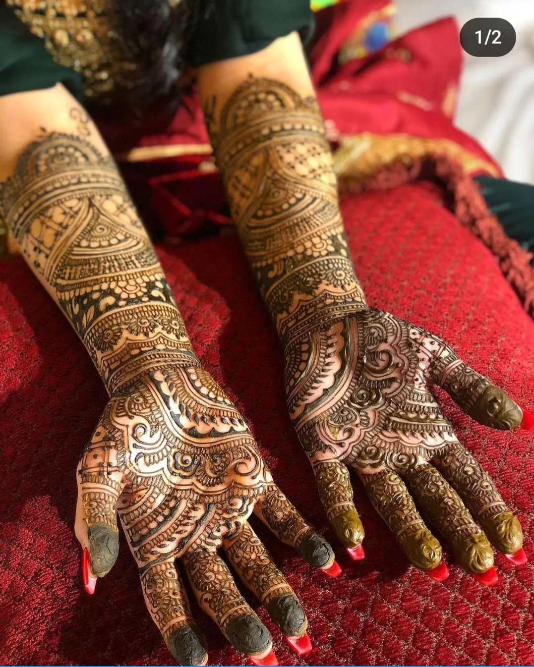 A bride's hand with a small trial henna design
